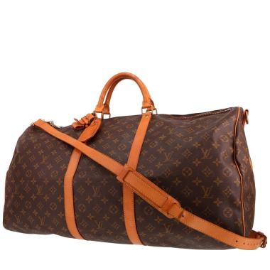 Louis Vuitton  Keepall 60 travel bag  in brown monogram canvas  and natural leather