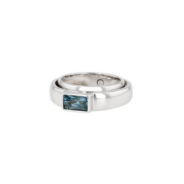 Bague tournante Piaget Swing en or blanc et topaze bleu