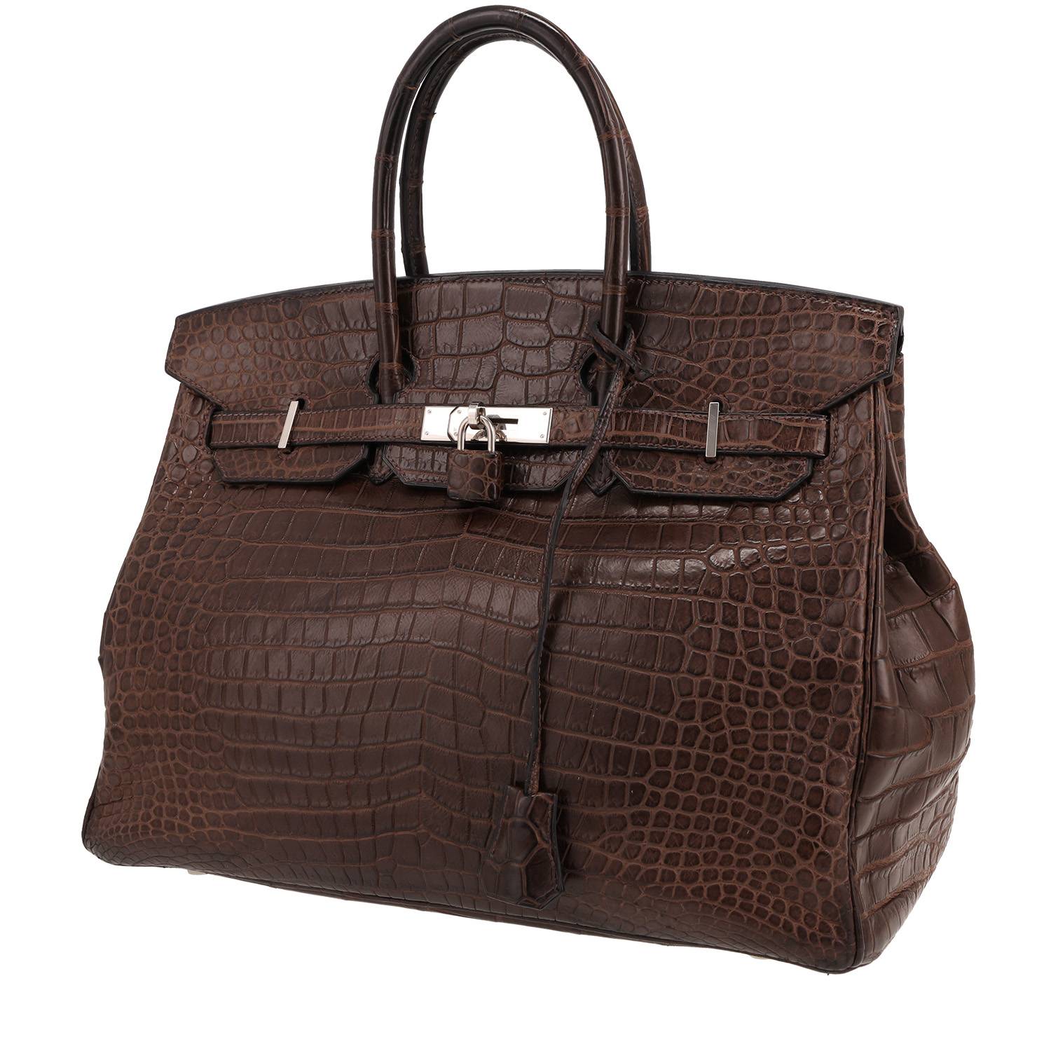Bolsa Hermès Birkin tamanho 35 em couro de crocodilo Porosus marrom usada.
