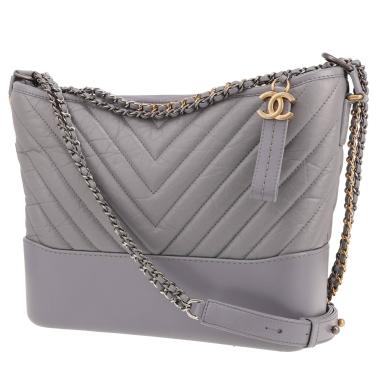 Borsa a tracolla Chanel  Gabrielle  modello medio  in pelle trapuntata a zigzag grigia