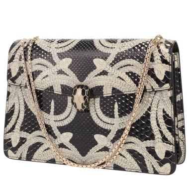 Bulgari  Serpentissima bag worn on the shoulder or carried in the hand  in black and gold and white python