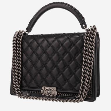 Sac bandoulière Chanel  Boy grand modèle  en cuir matelassé noir