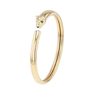 Brazalete redondo Cartier Panthère de oro amarillo, tsavoritas y ónix