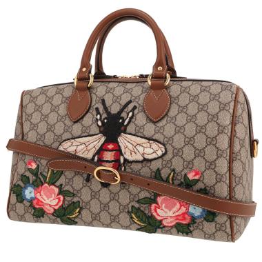 Gucci  Boston handbag  in beige "sûpreme GG" canvas  and brown leather