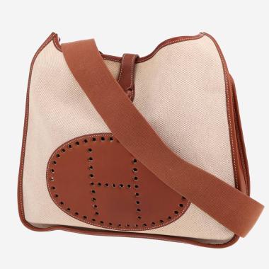 Sac bandoulière Hermès  Evelyne en cuir Barénia fauve et toile beige