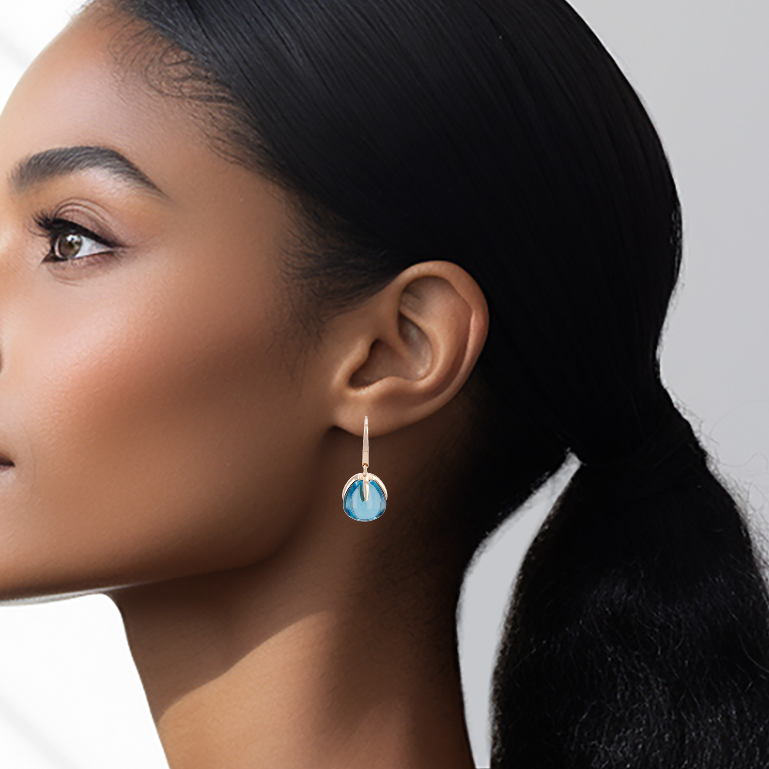 Pomellato Veleno earrings in pink gold and topaz