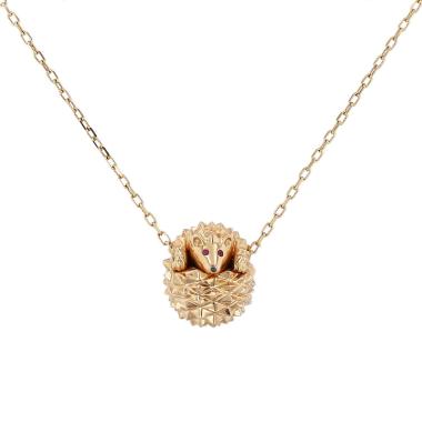 Collier Boucheron Hans le Hérisson en or rose, rubis et diamant noir