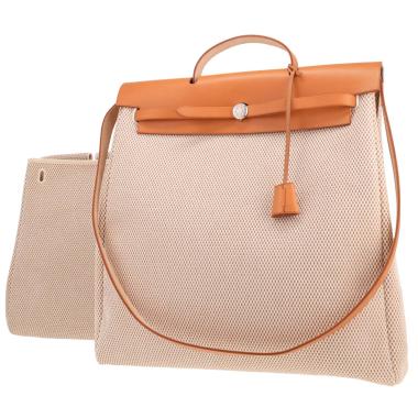 Bolso para llevar al hombro o en la mano Hermès  Herbag en lona beige y vaca Hunter