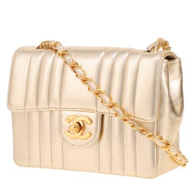 Bolso bandolera Chanel  Timeless Mini en cuero acolchado dorado