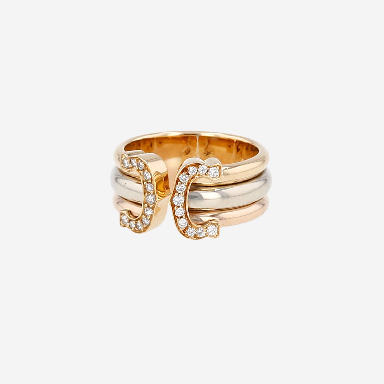 Anillo «C de Cartier» de Cartier, modelo grande, en tres tipos de oro y diamantes