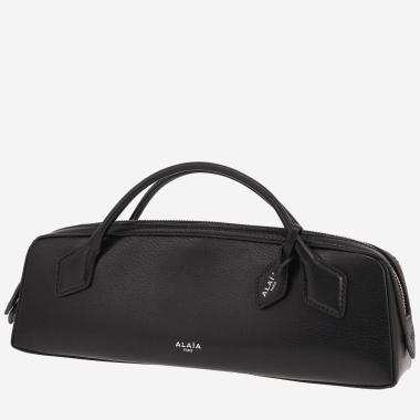 Alaïa Clutch: The Teckel Clutch in black leather