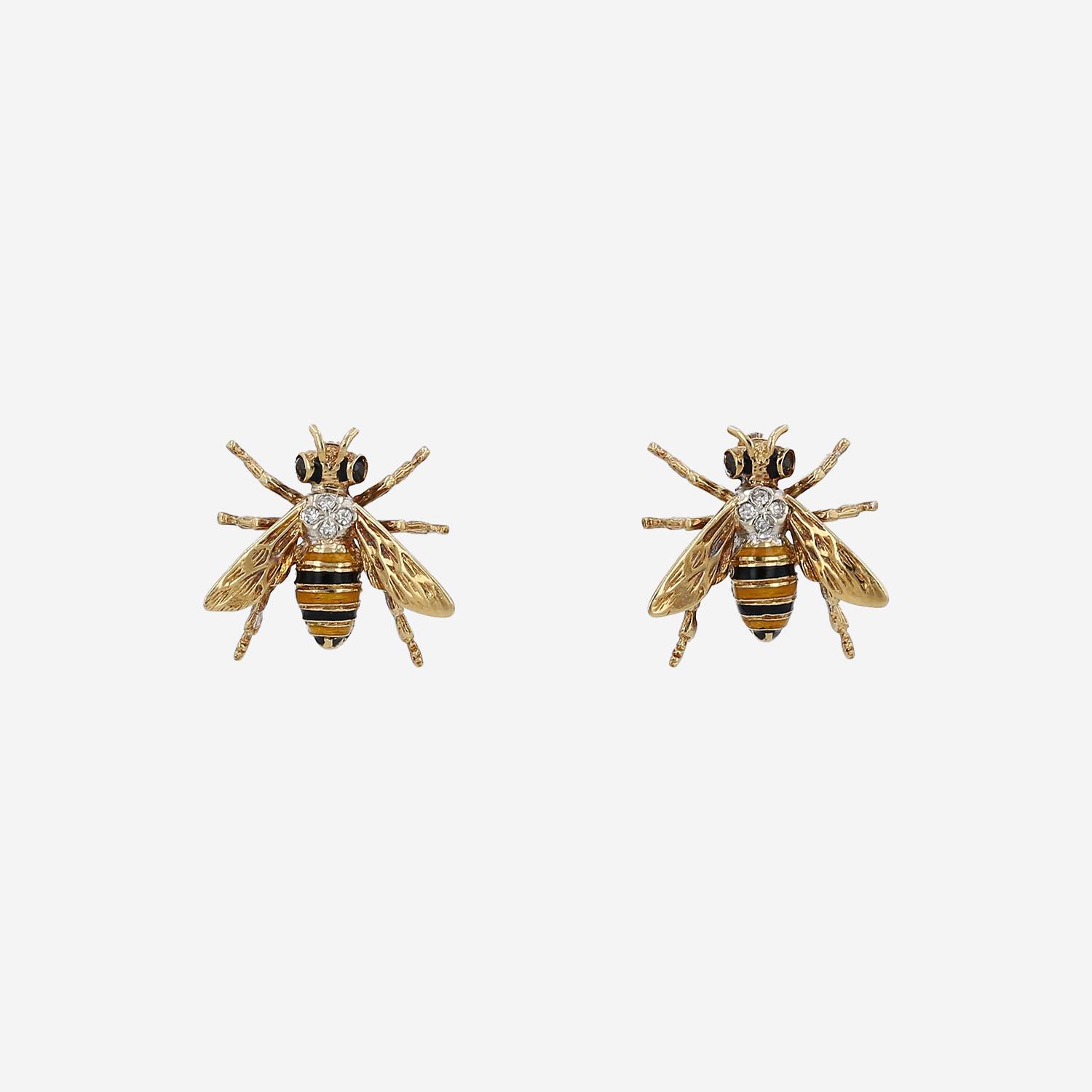 Coppia di spille vintage in oro giallo, smalto e diamanti