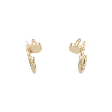 A pair of Cartier Juste un clou small hoop earrings in yellow gold