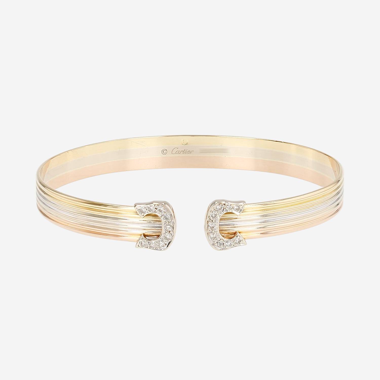 Pulsera «C de Cartier» de Cartier en tres tipos de oro y diamantes