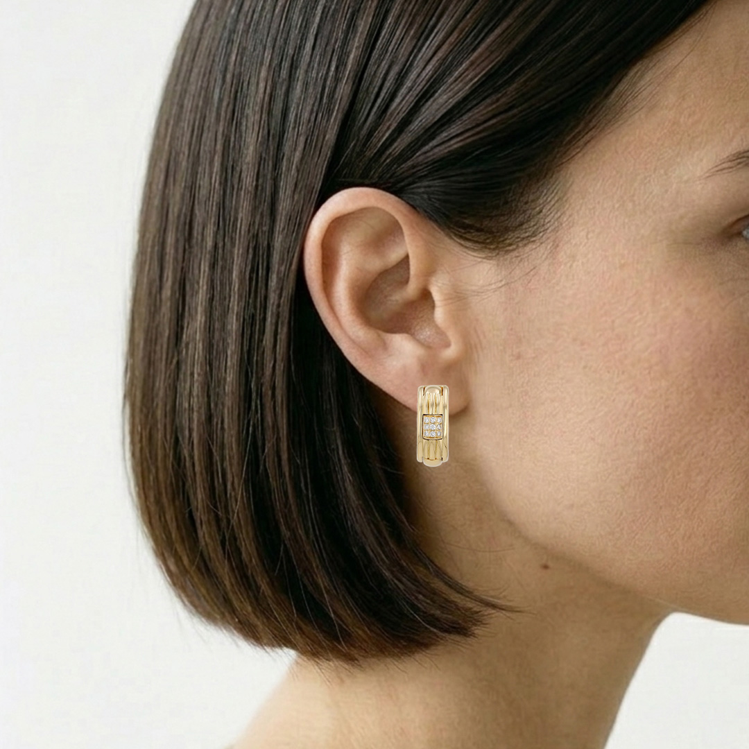 Par de pendientes de clip Boucheron Pluriel en oro amarillo y diamantes