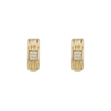 A pair of Boucheron Pluriel ear clips in yellow gold and diamonds