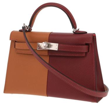 Bolso Hermès Kelly de 20 cm, en piel Epsom roja con letras H y detalles dorados