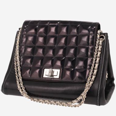 Chanel handbag   in black patent leather