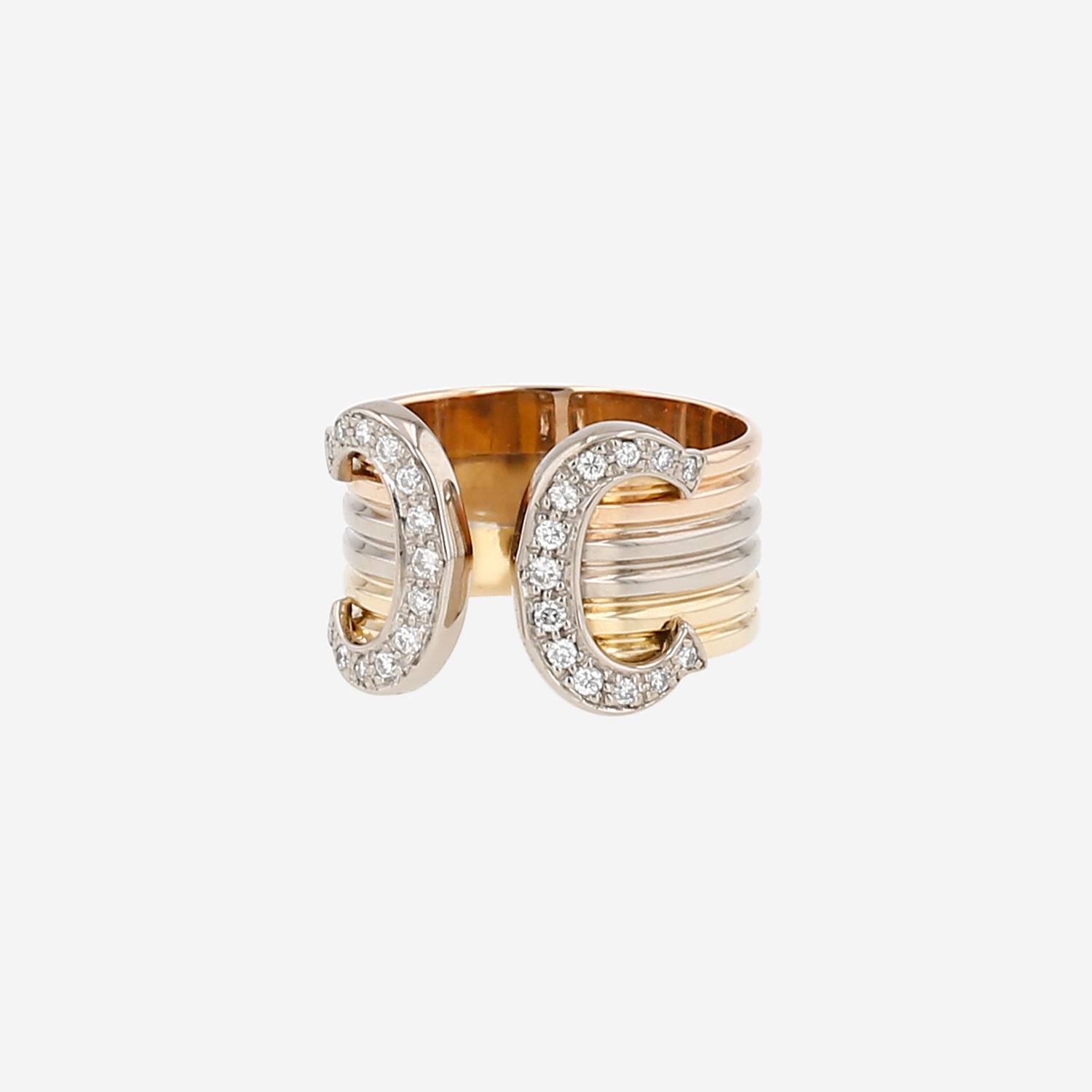 Anillo «C de Cartier» de Cartier, modelo grande, en tres tipos de oro y diamantes
