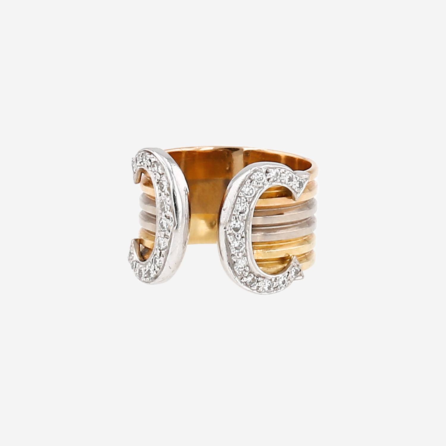 Anillo «C de Cartier» de Cartier, modelo grande, en tres tipos de oro y diamantes