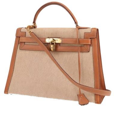 Bolso Hermès Kelly de 32 cm en lona beige y piel Gold