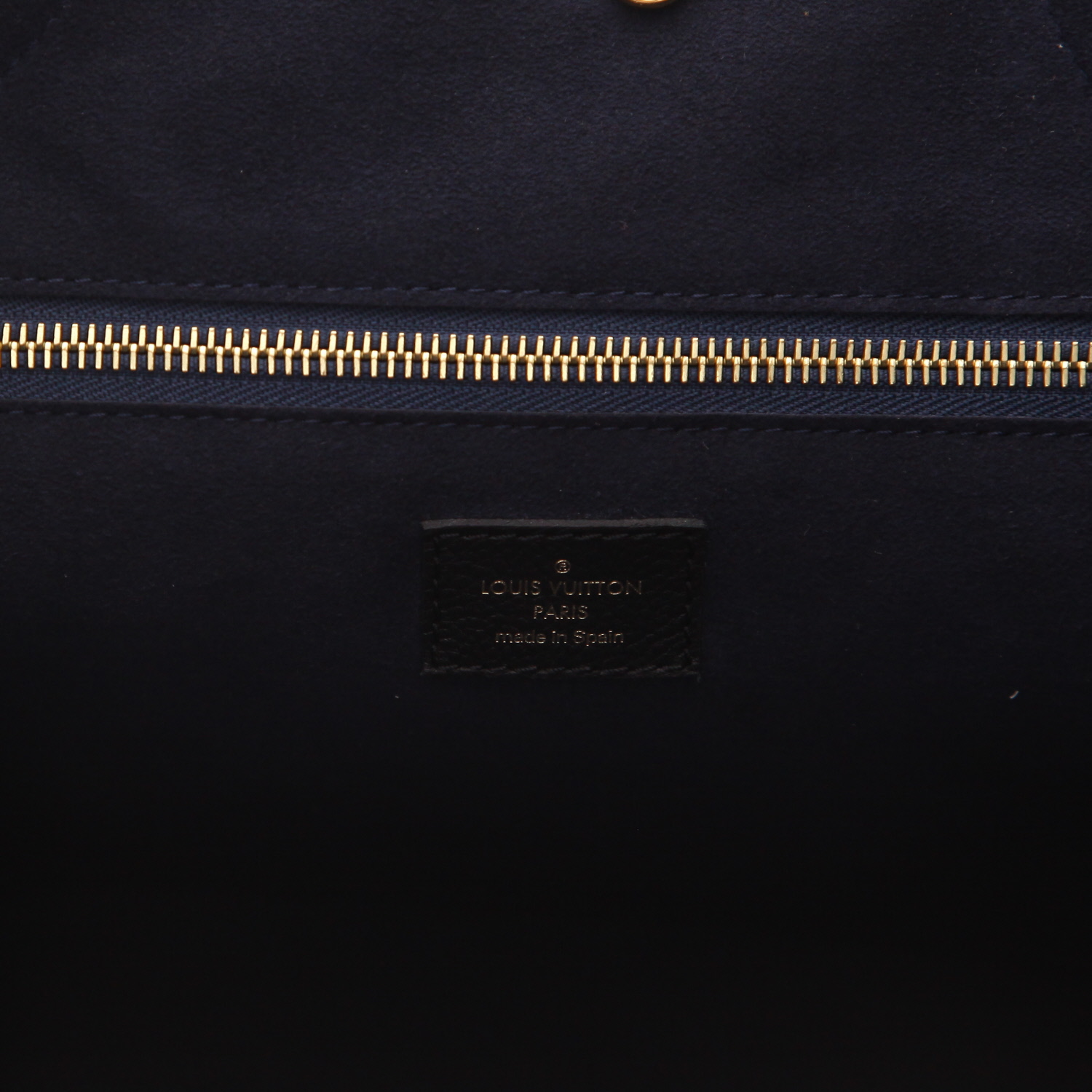 Louis Vuitton Neverfull tote bag in Noir Monogram Empreinte leather - Detail D2