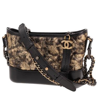 Borsa a tracolla Chanel  Gabrielle  modello piccolo  in pelle trapuntata nera e dorata e pelle nera