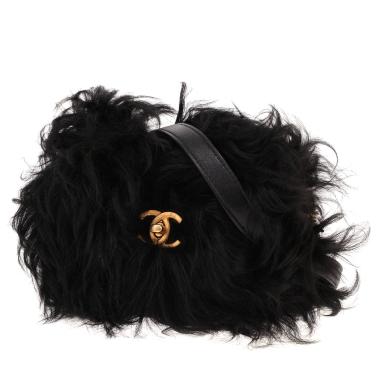 Bolso bandolera de Chanel de piel sintética negra
