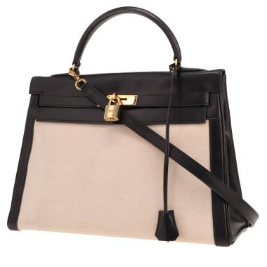 Borsa Hermès Kelly 32 cm in pelle nera “box” e tela beige