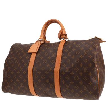 Louis Vuitton Keepall 50 travel bag in brown Monogram canvas and natural leather