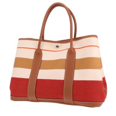 Sac cabas Hermès  Garden Party 36 cm en toile beige rouge et gold et cuir gold