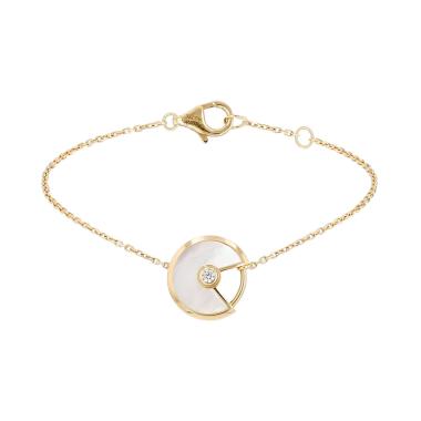 Bracciale Cartier Amulette in oro giallo, diamanti e madreperla