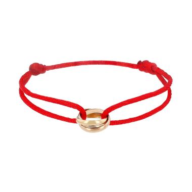 Bracelet Cartier Trinity sur cordon en 3 ors
