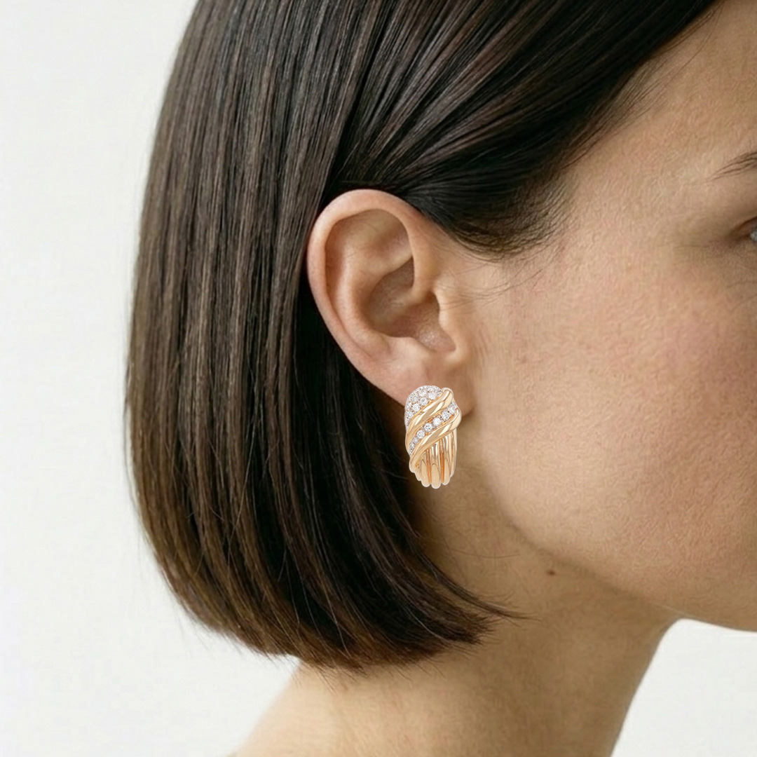 A pair of vintage earrings in yellow gold and diamonds