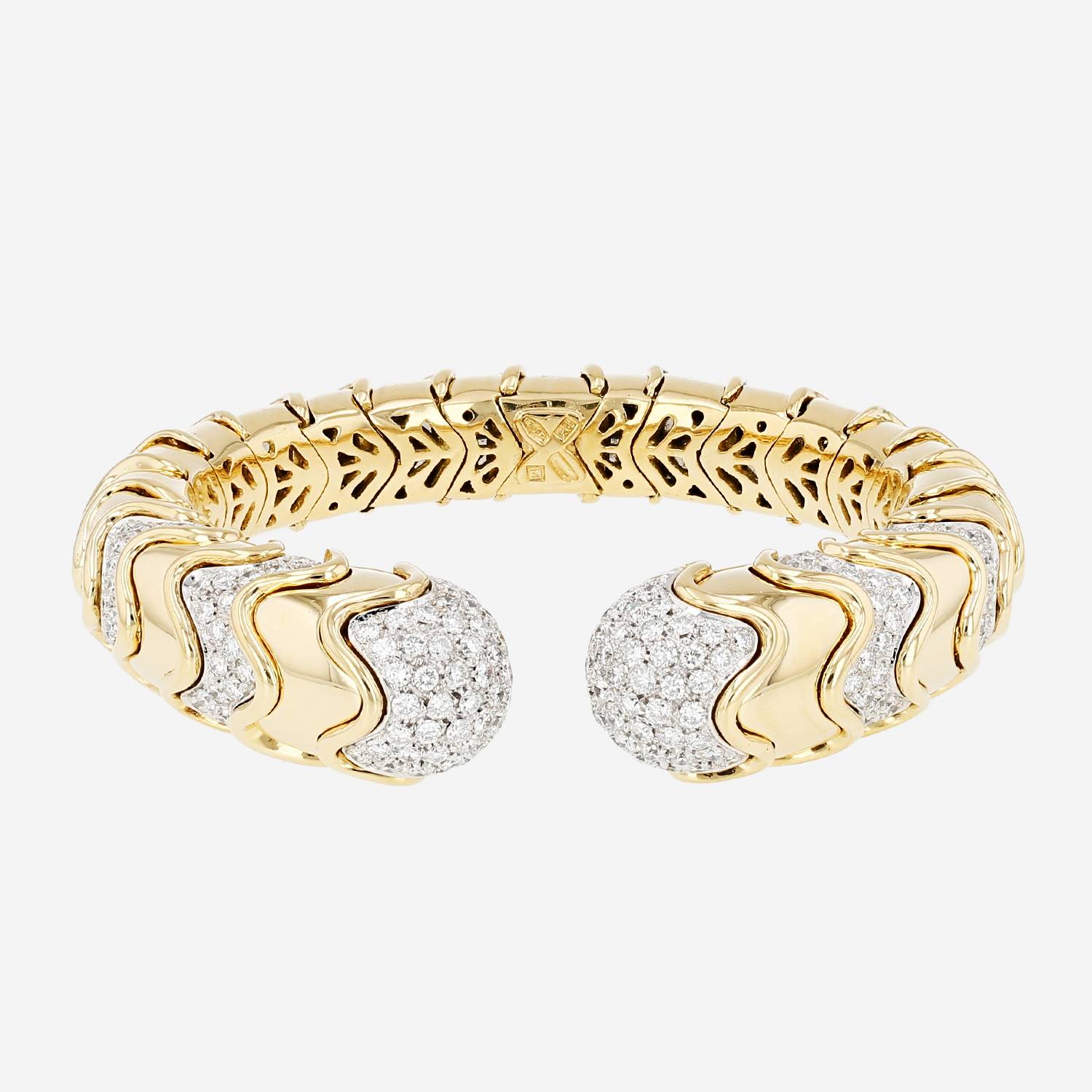 Bracciale a giro vintage in oro giallo, oro bianco e diamanti