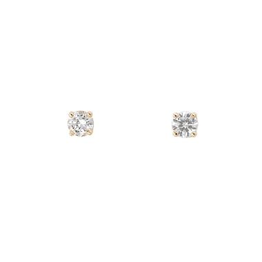 A pair of Fred earrings in yellow gold and diamonds