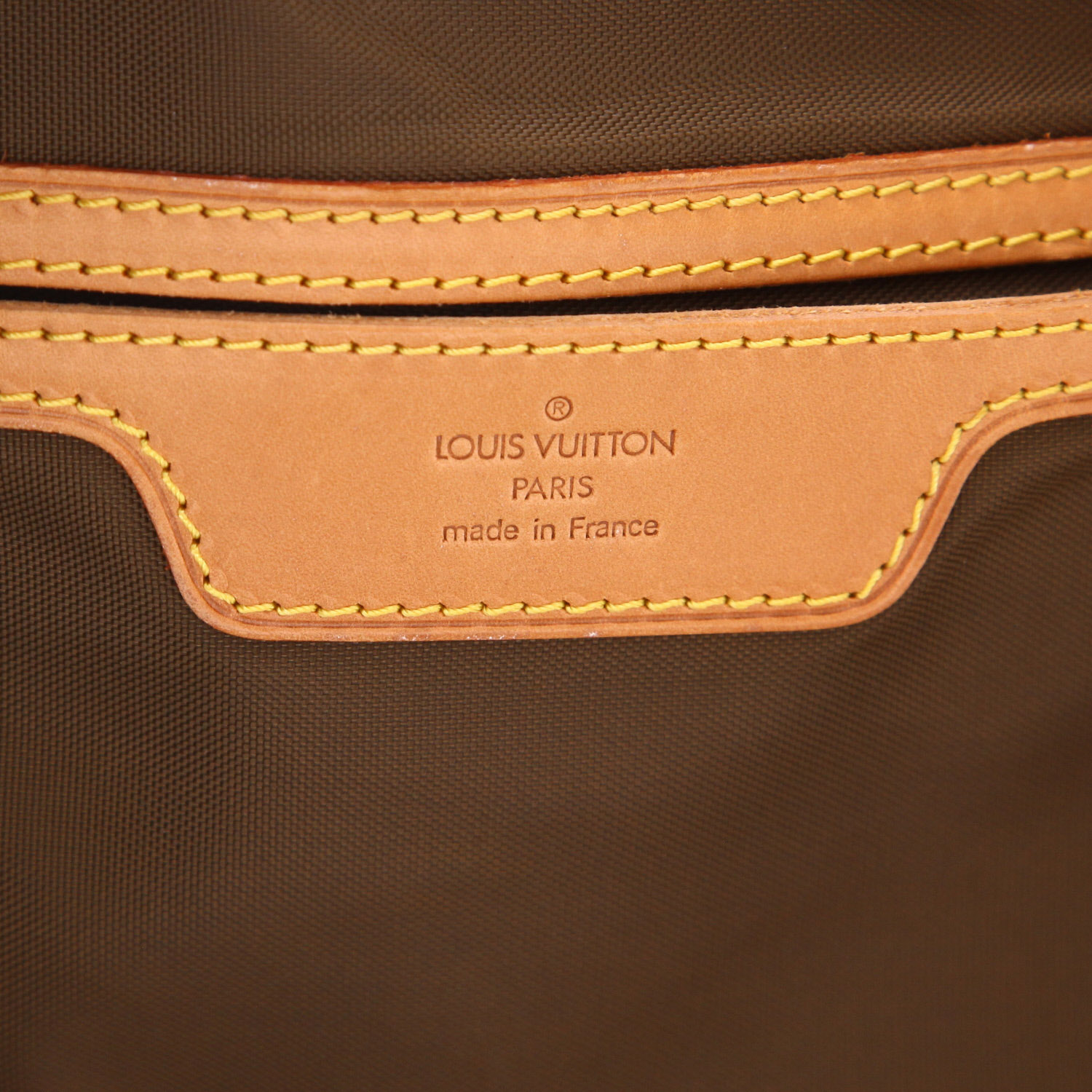 Louis Vuitton ‘Evasion’ travel bag in brown Monogram canvas and natural leather - Detail D2