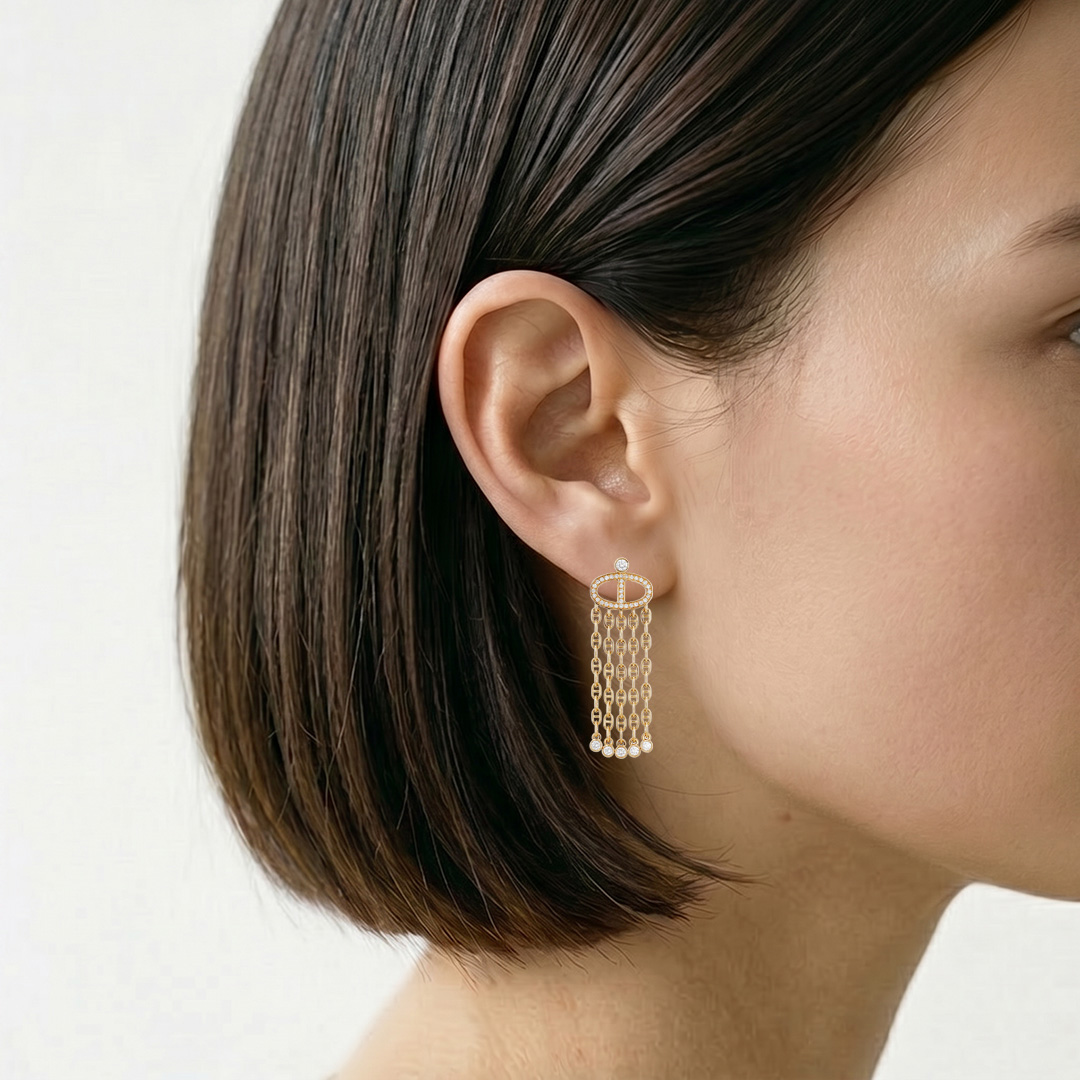 A pair of Hermès Chaîne d’Ancre Calypso earrings in yellow gold and diamonds