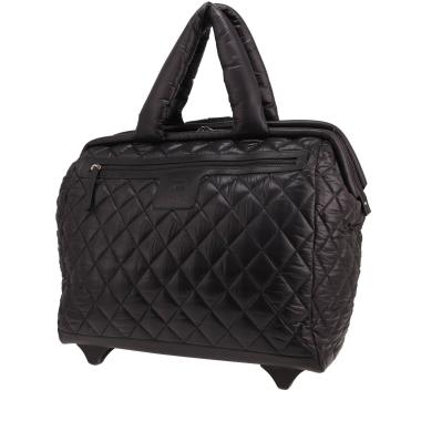 Chanel Coco Cocoon travel bag in black quilted canvas and black leather
