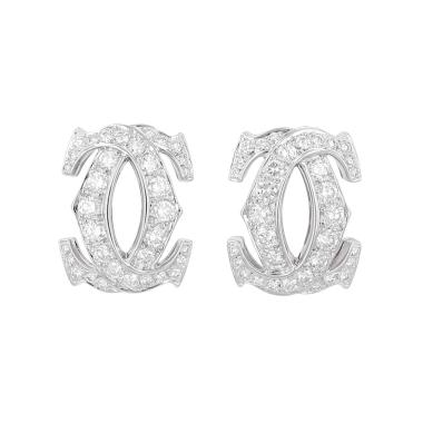 A pair of Cartier Pénélope ear clips in white gold and diamonds