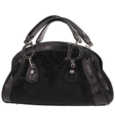 Vintage Dior handbag in black logo-printed canvas and black patent leather