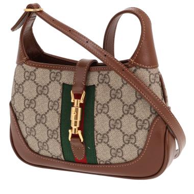 Gucci Jackie Mini shoulder bag in beige GG Supreme canvas and brown leather