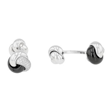 A pair of Cartier Trinity cufflinks in white gold, black ceramic and diamonds