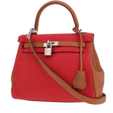 Hermès Kelly 25 cm handbag in red and gold Togo leather