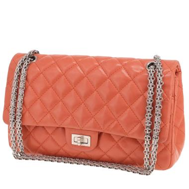 Chanel 2.55 handbag in coral quilted leather