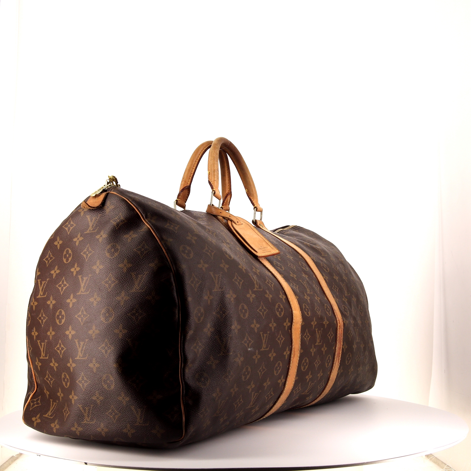 Louis Vuitton  Keepall 60 travel bag  in brown monogram canvas  and natural leather
