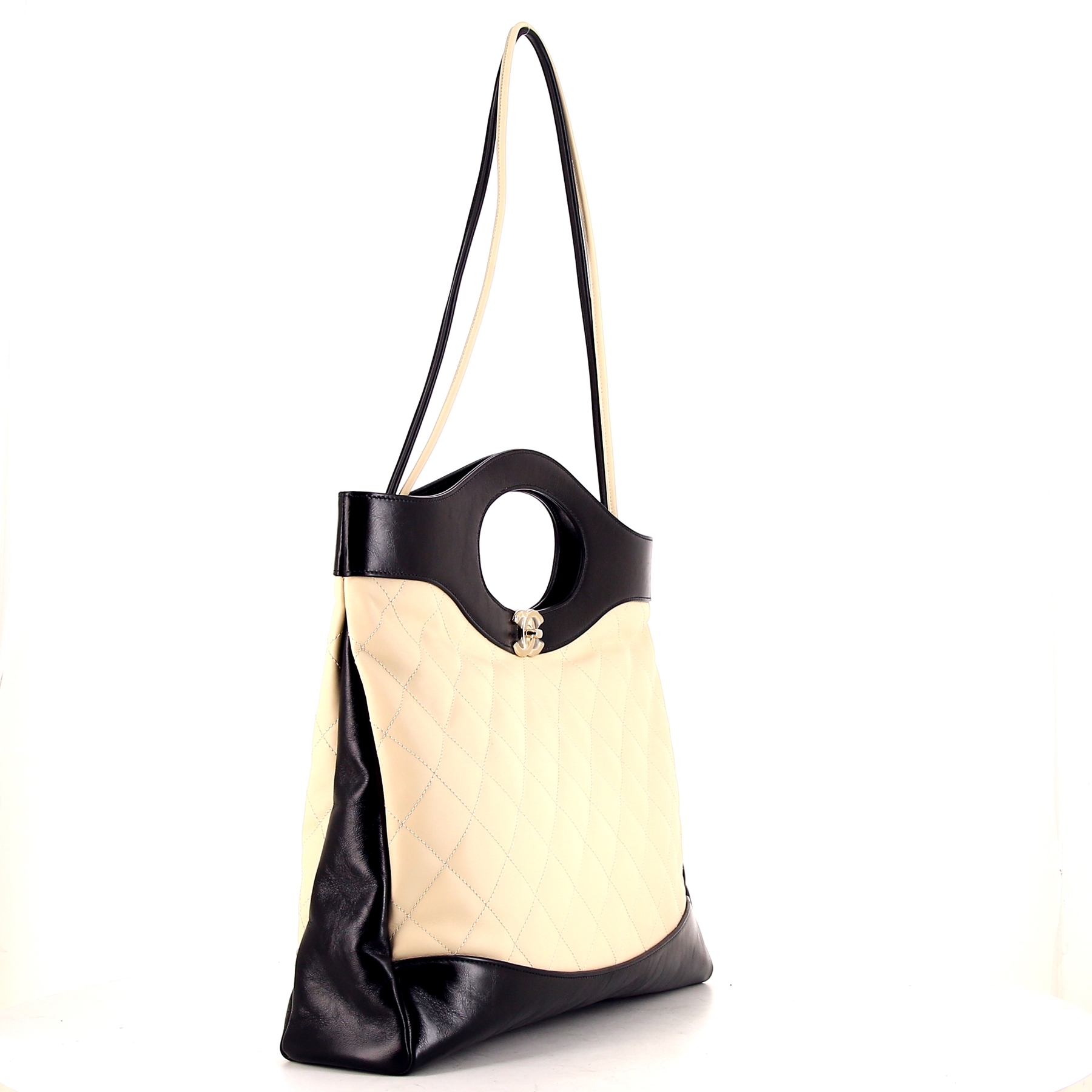 Chanel 31 handbag in white quilted leather and black leather