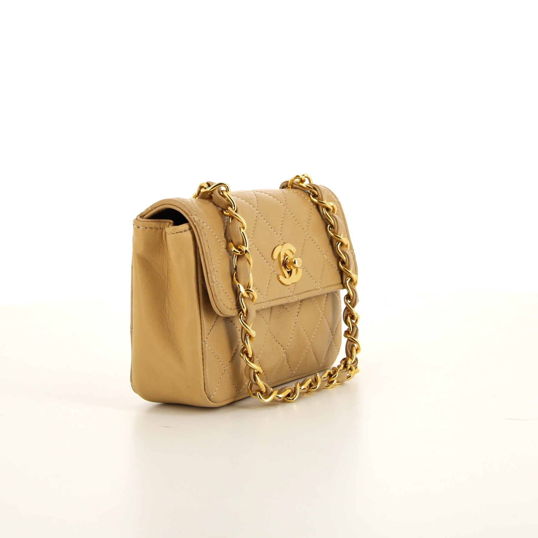 Chanel Mini Timeless shoulder bag in beige quilted leather