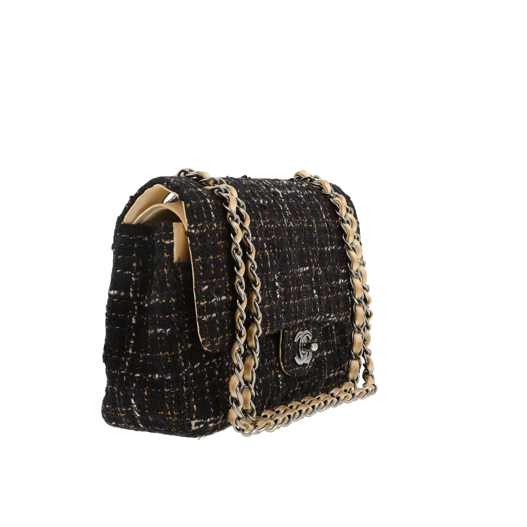 Chanel  Timeless Classic handbag  in black and cream color quilted tweed  and cream color leather