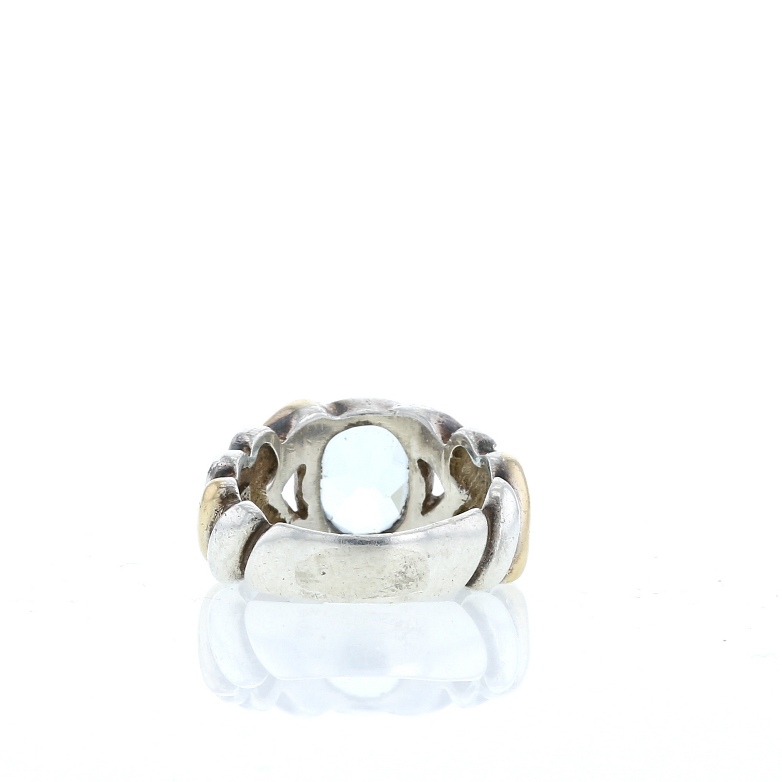 Ring In Silver, Yellow Gold And Topaz